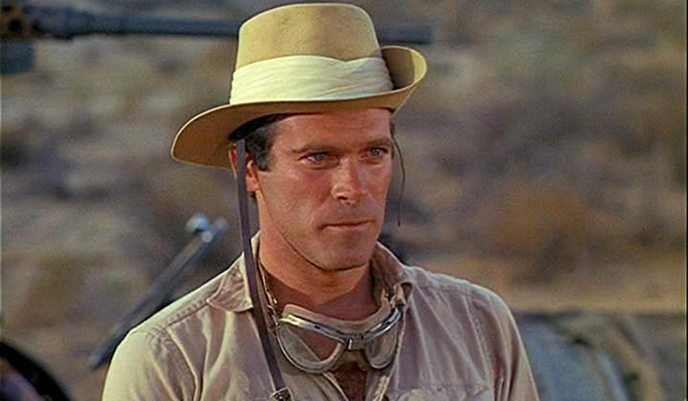 Christopher George as Sgt. Sam Troy in The Rat Patrol