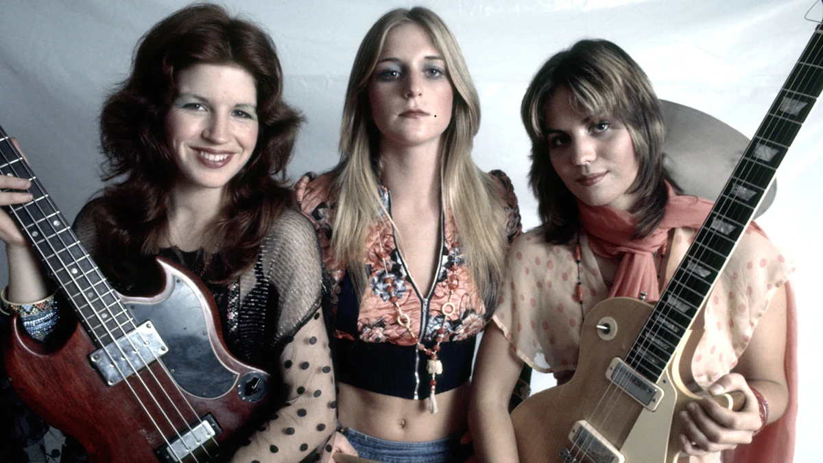 Sandy West with two bandmates from The Runaways